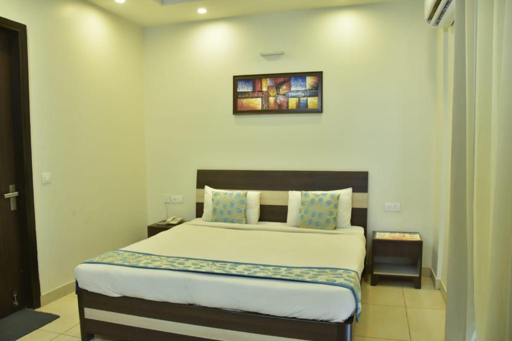 Postel nebo postele na pokoji v ubytování Hotel Wedlock 38