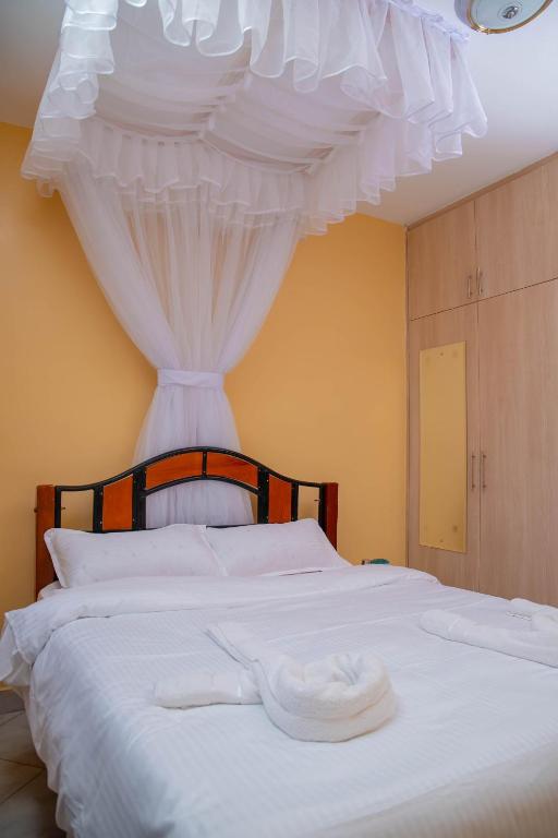 Postel nebo postele na pokoji v ubytování cla bnb