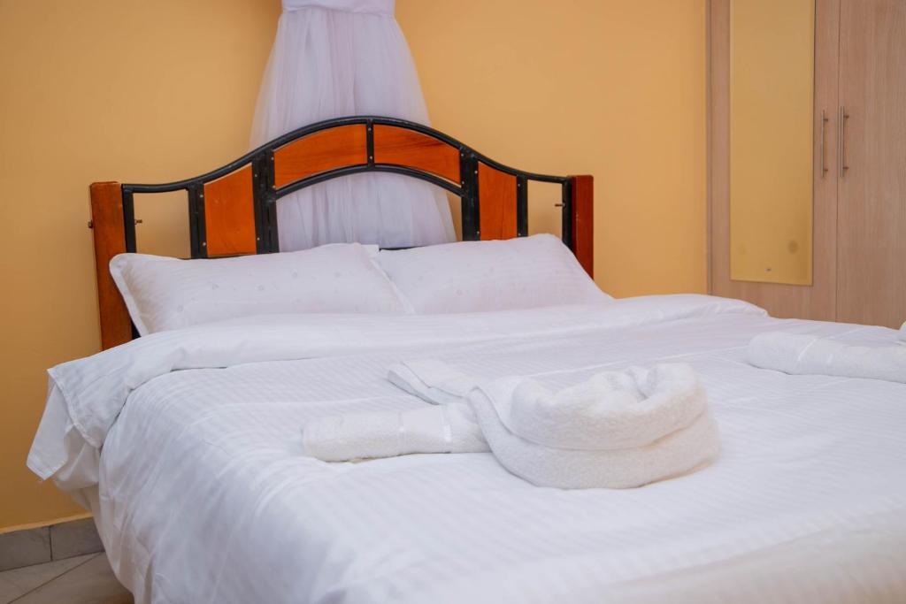 Postel nebo postele na pokoji v ubytování cla bnb