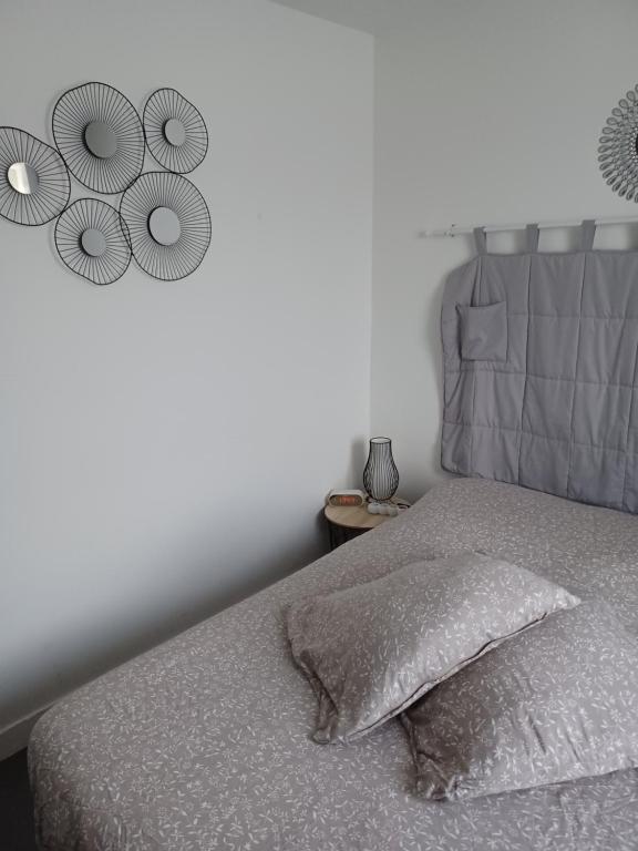 Postel nebo postele na pokoji v ubytování Chambre