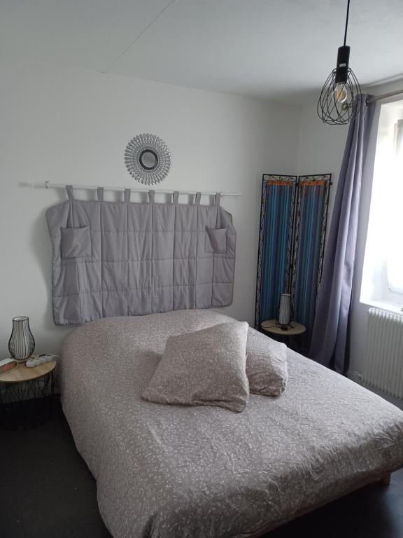 Postel nebo postele na pokoji v ubytování Chambre