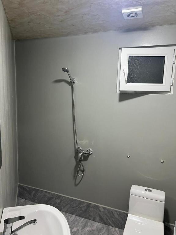 Koupelna v ubytování Hotel Amigo