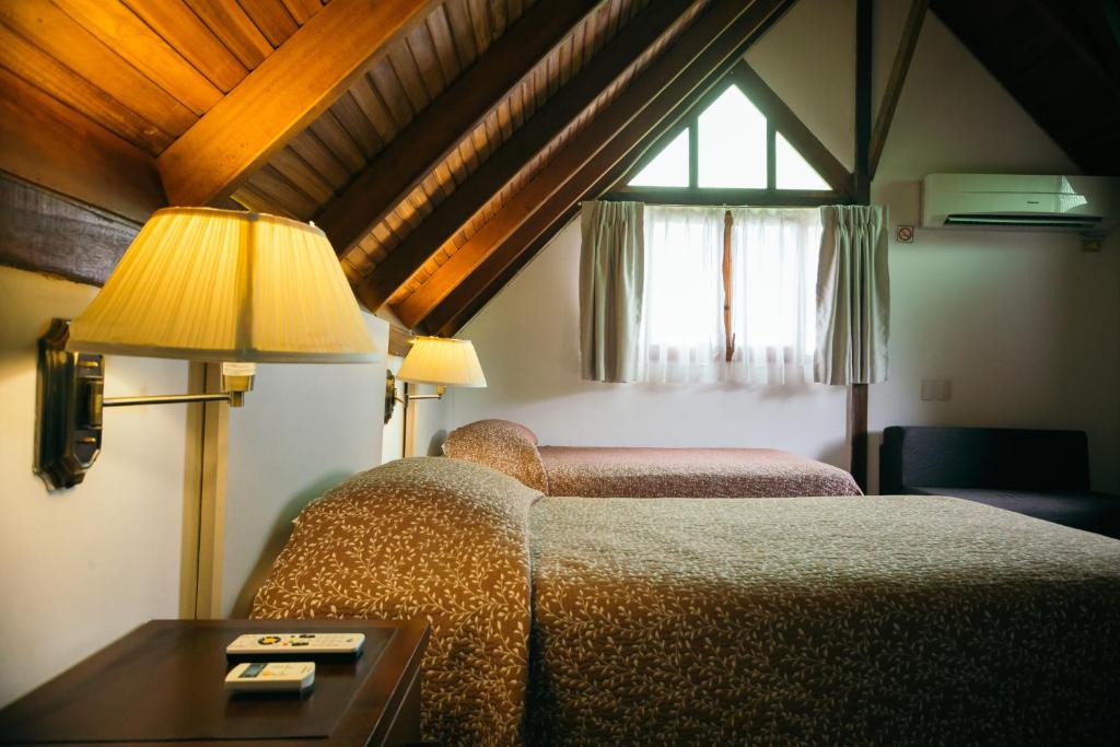 Postel nebo postele na pokoji v ubytování Hotel Balandra