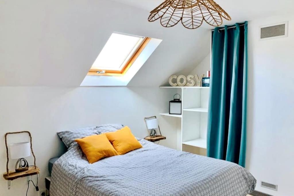 Postel nebo postele na pokoji v ubytování Gîte Le Cosy, T1 à 50m de la mer, centre Ault