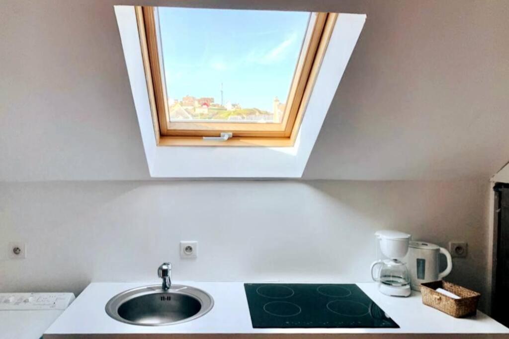 Kuchyň nebo kuchyňský kout v ubytování Gîte Le Cosy, T1 à 50m de la mer, centre Ault