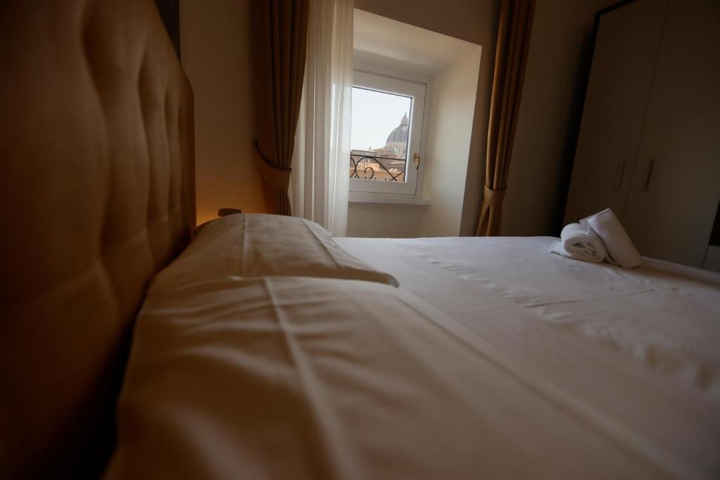 Posteľ alebo postele v izbe v ubytovaní B&B A Picture of Rome