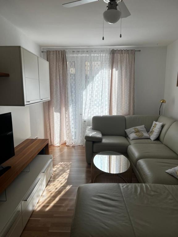 Posezení v ubytování Schönes Zuhause
