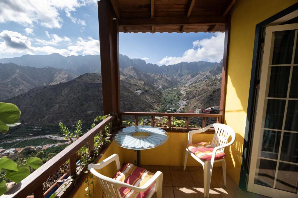 a balcony with a view of the mountains at Lightbooking Claudia Hermigua La Gomera in Hermigua