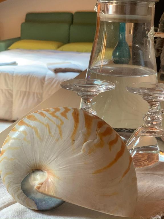 Postel nebo postele na pokoji v ubytování A Casa di Lidia 15 min dal Lago di Garda e Verona Centro Vicinissima Terme Acquardens