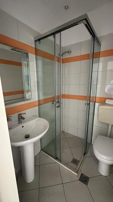 Koupelna v ubytování Hotel Jon