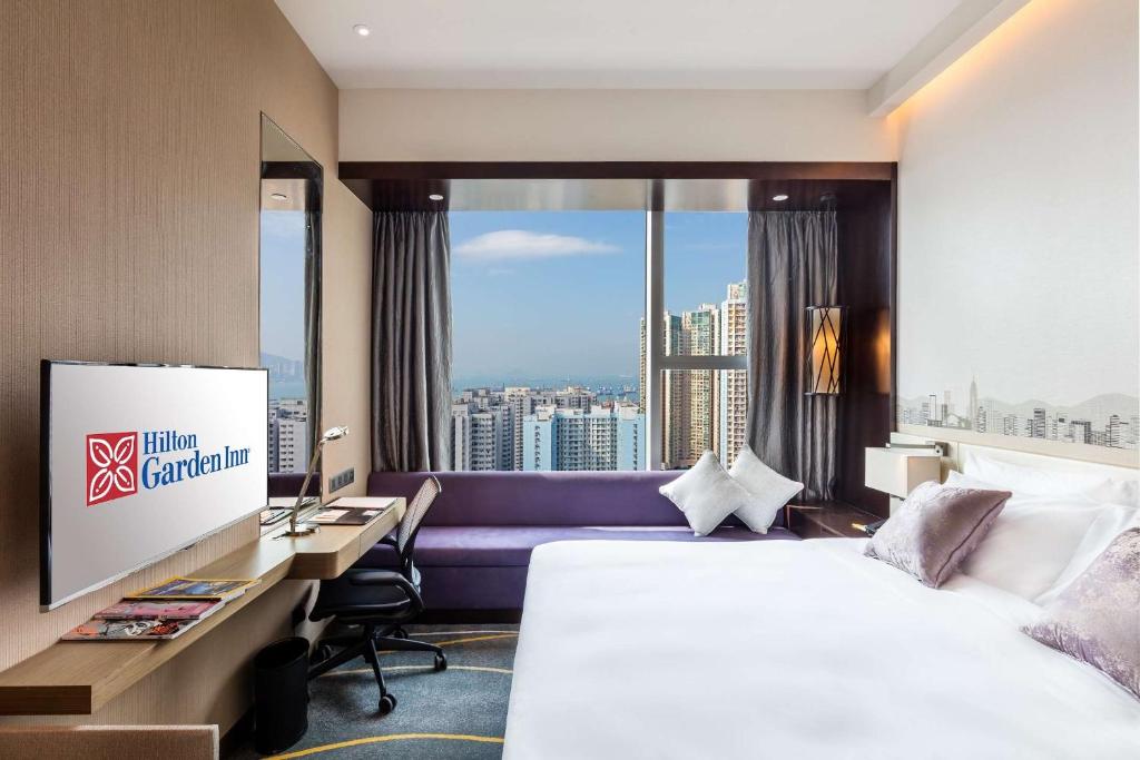 Letto o letti in una camera di Hilton Garden Inn Hong Kong Mongkok