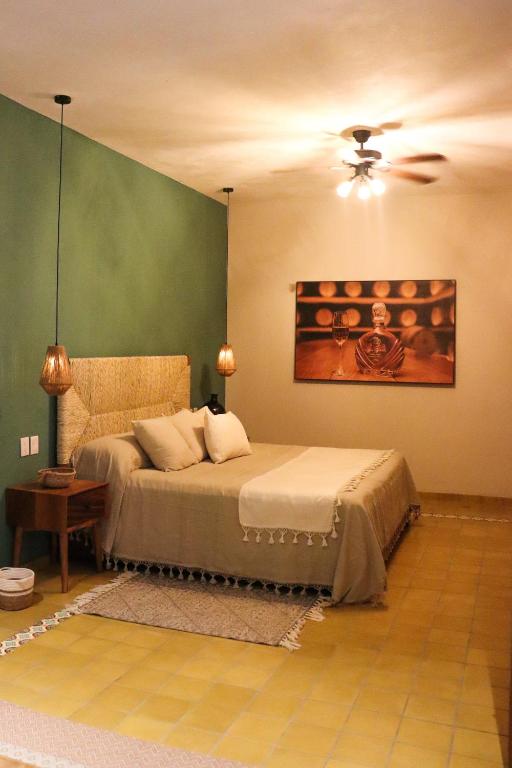 Postel nebo postele na pokoji v ubytování Hotel Boutique Gloriagave