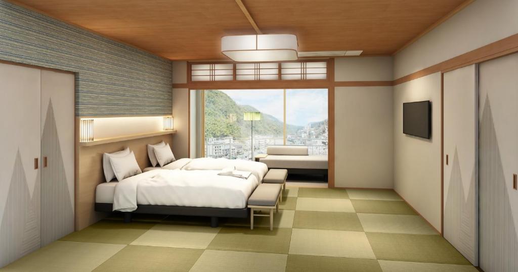 a bedroom with a bed and a large window at Miharashinoyado Fronden in Hita