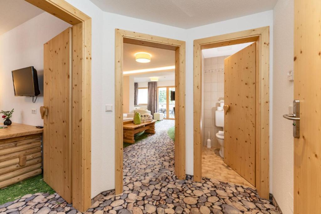 TV a/nebo společenská místnost v ubytování Hartweger's Hotel