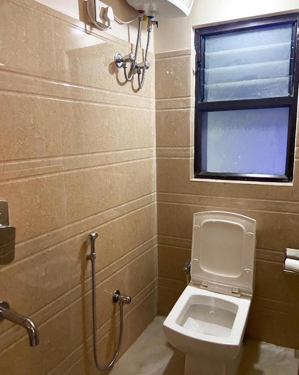 Koupelna v ubytování Indivar Homestay
