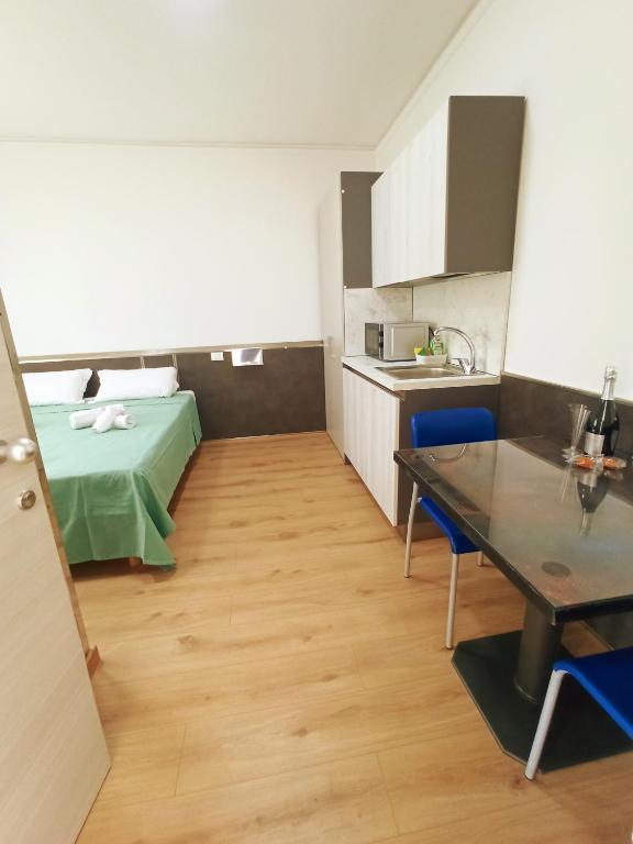 Kuchyň nebo kuchyňský kout v ubytování Affittacamere Ai Pila