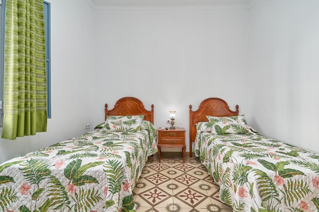 Postel nebo postele na pokoji v ubytování Casa Rafalita