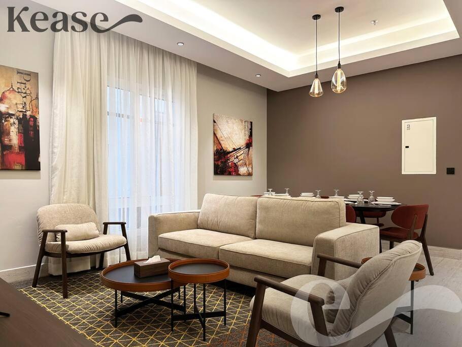 a living room with a couch and a table at Kease King Salman G-1 Lusso Najd GX96 in Riyadh