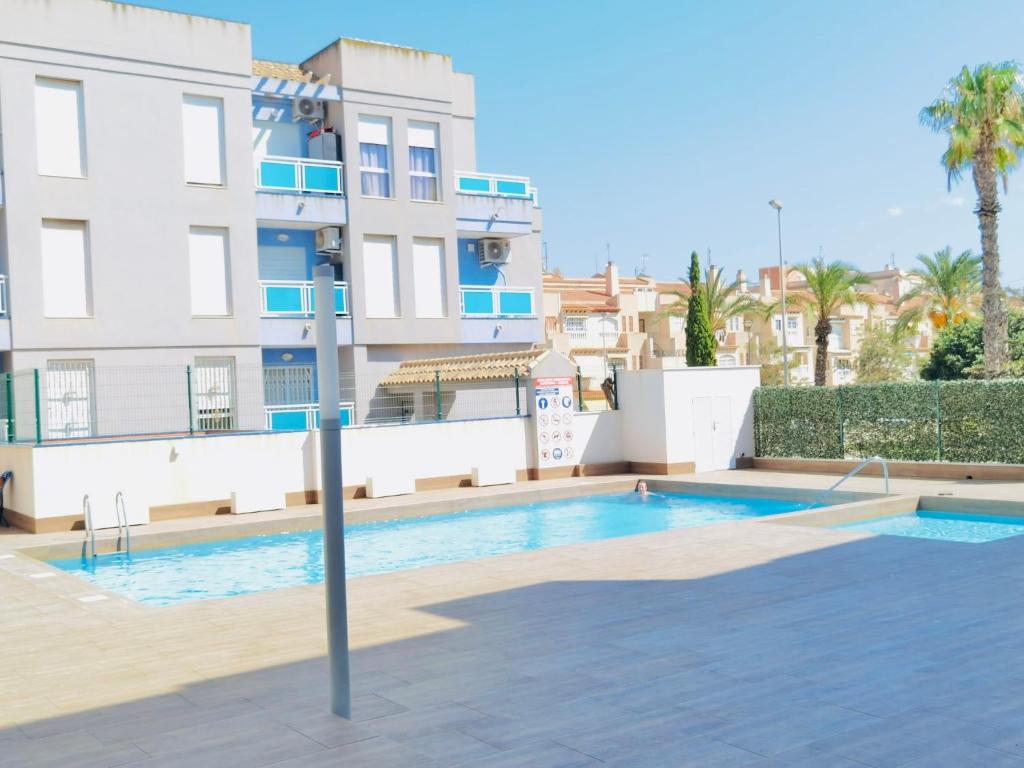 Bazén v ubytovaní Luxury Apartment Torrevieja alebo v jeho blízkosti