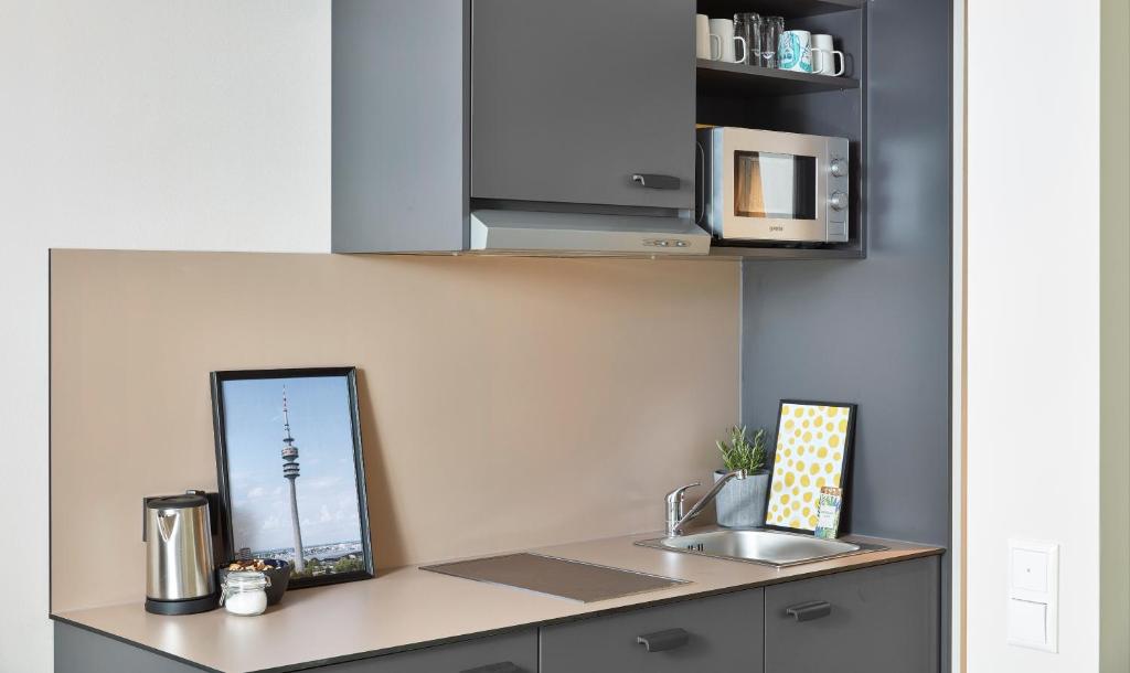 Living Hotel am Olympiapark - Resim 31