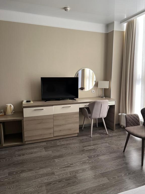 TV a/nebo společenská místnost v ubytování Elite Hotel