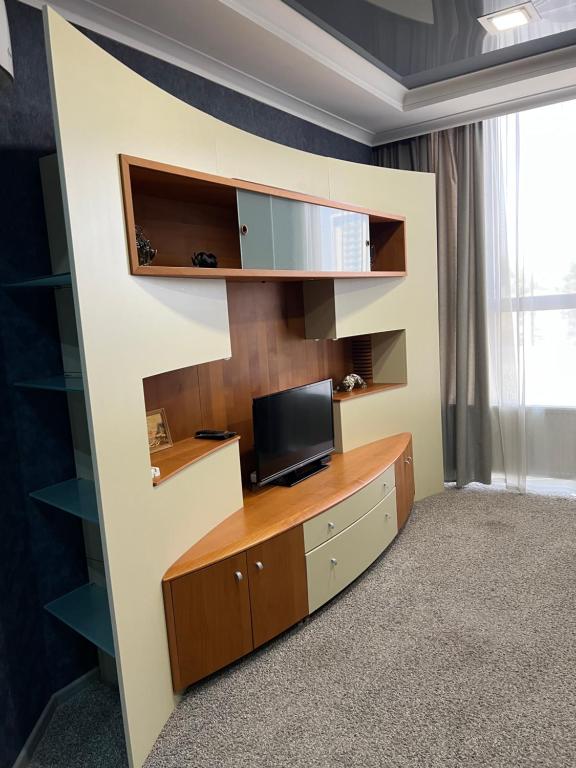 TV a/nebo společenská místnost v ubytování Elite Hotel