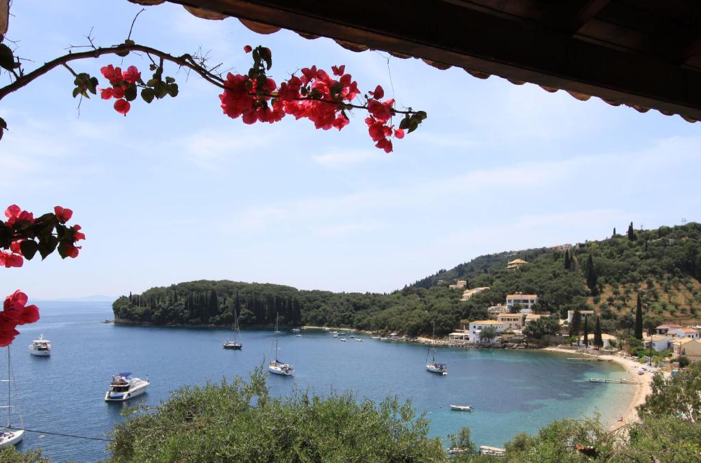 a view of a bay with boats in the water at Votsalo Kalami Apartments in Kalami