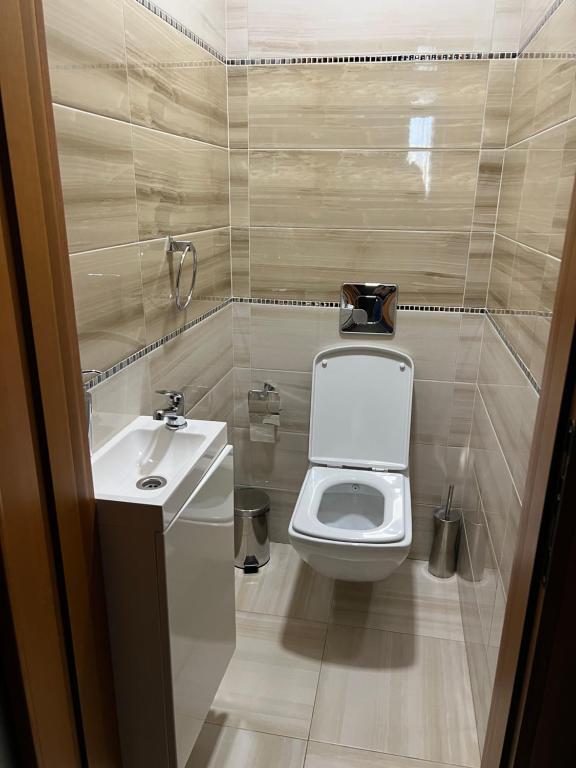 Koupelna v ubytování Elite Hotel