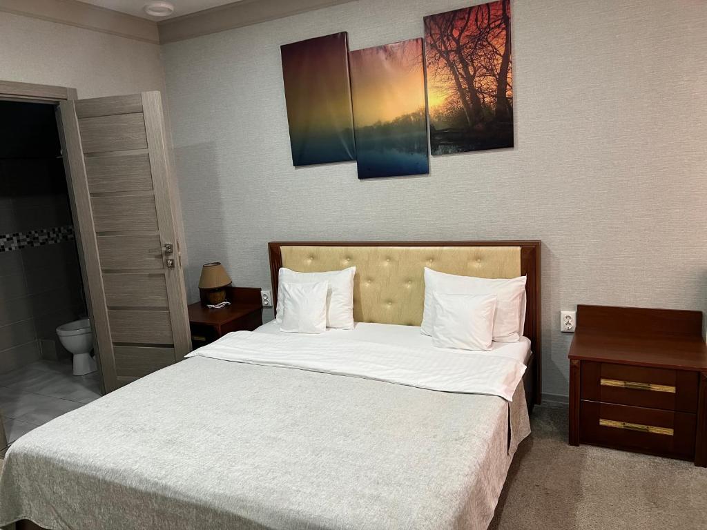 Postel nebo postele na pokoji v ubytování Elite Hotel