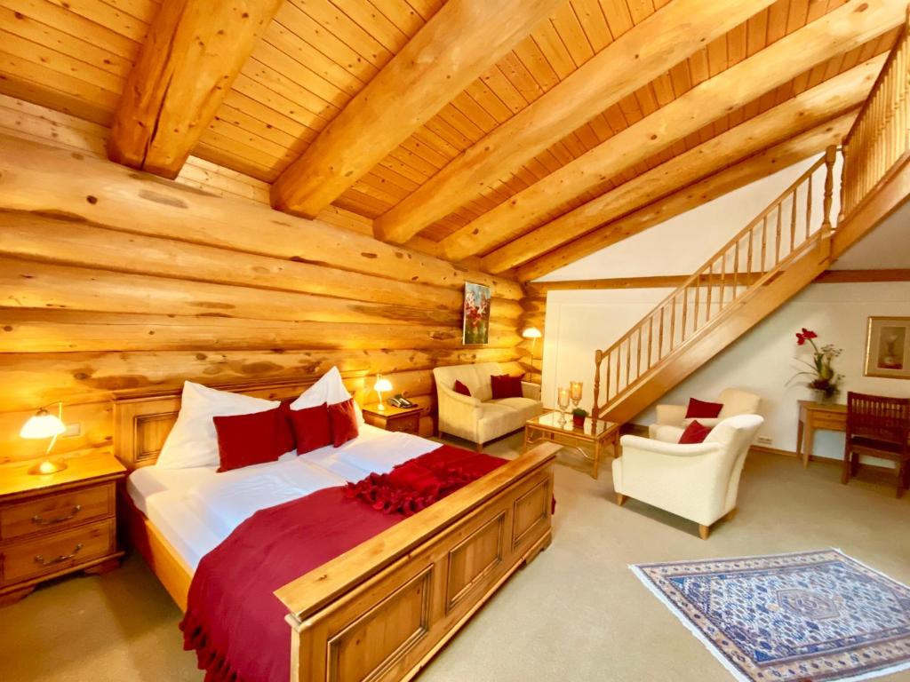 Postel nebo postele na pokoji v ubytování Hotel Sonnenhof Aspach