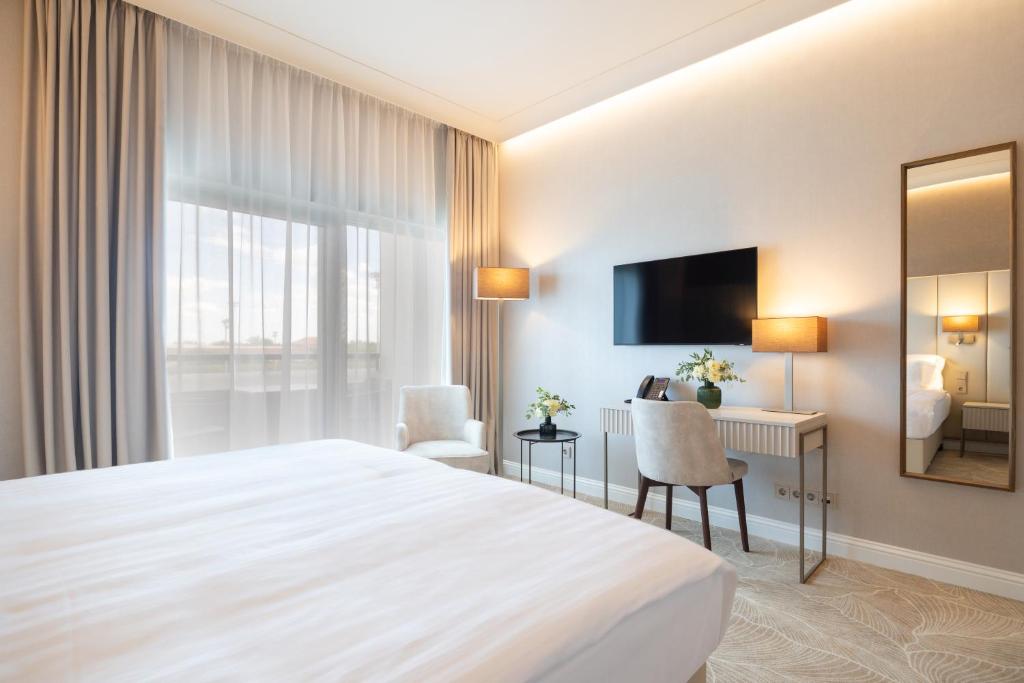Postel nebo postele na pokoji v ubytování Hotel Gerardus