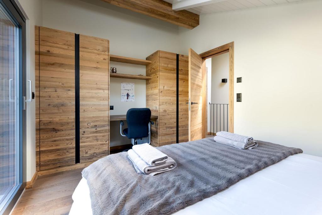 Postel nebo postele na pokoji v ubytování Chalet Aigle