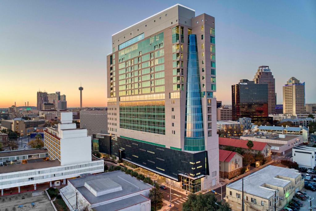 a view of a tall building in a city at Thompson San Antonio - Riverwalk, by Hyatt in San Antonio