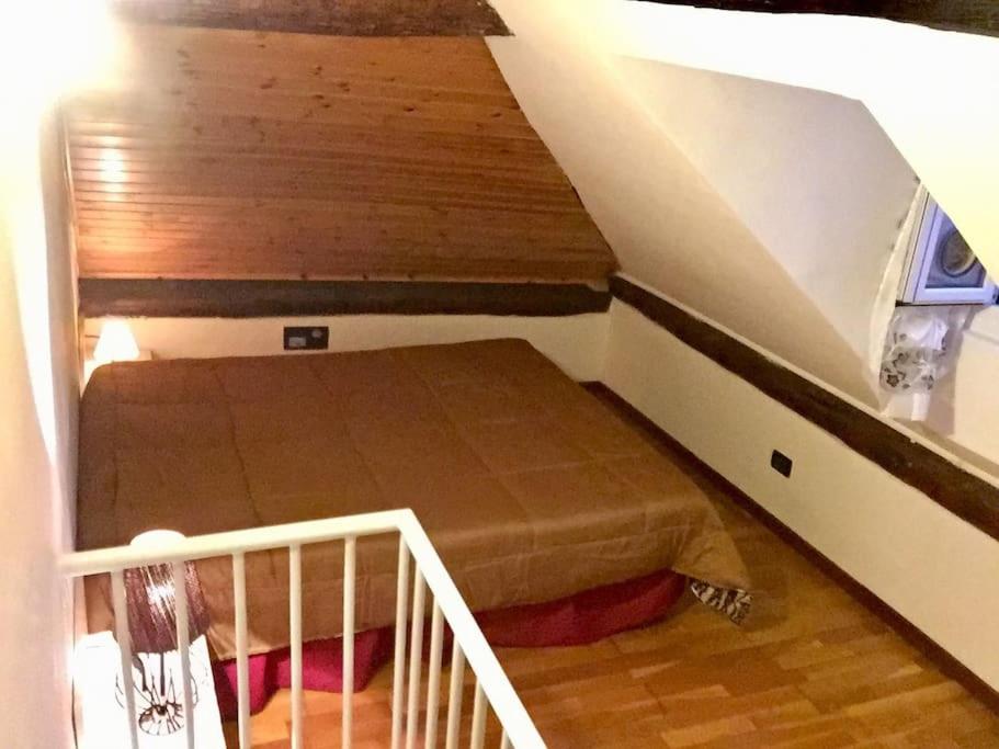 a small room with a bed in a attic at M Home Genova Sestri Ponente 010025-LT-1596 in Genoa