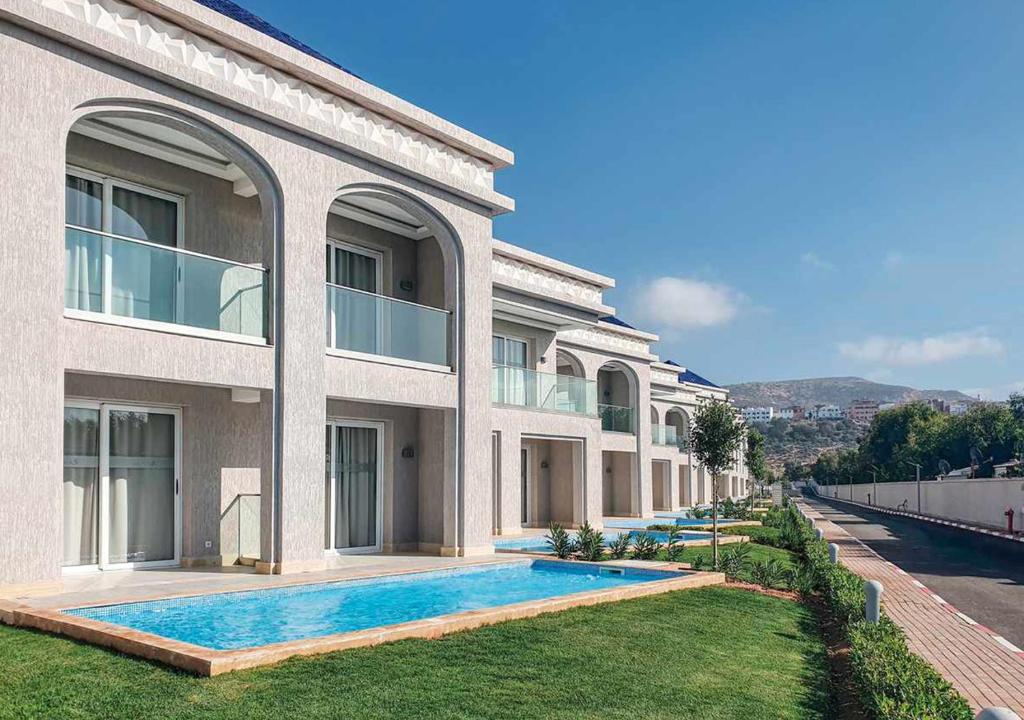 Pickalbatros White Beach Taghazout - Adults Friendly 16 Years Plus - Ultra All Inclusive - 带有放松游泳池的花园景观