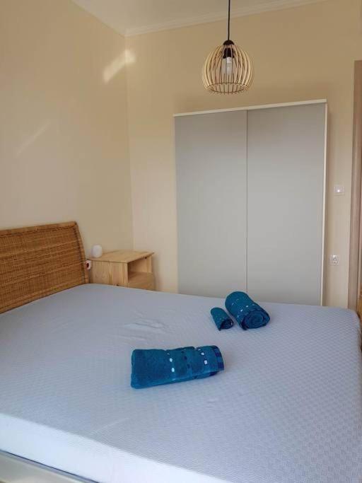 Posteľ alebo postele v izbe v ubytovaní Orange Apartment