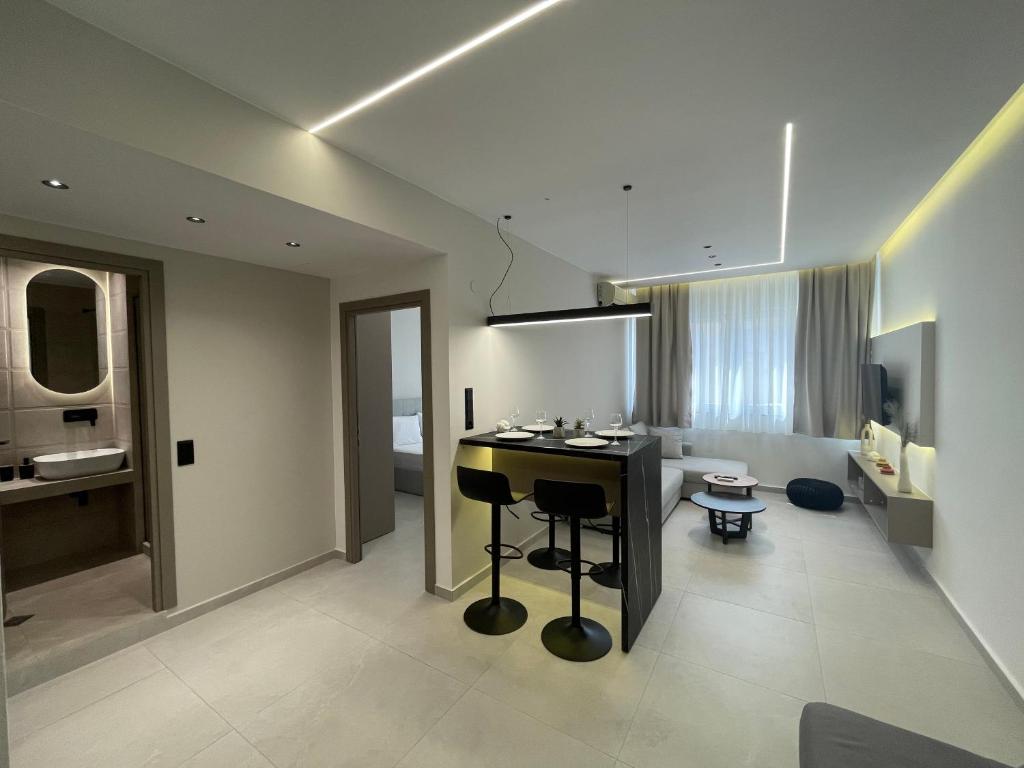 a bathroom with a counter and a sink in a room at Ladadika Luxury Apartment #4 in Thessaloniki