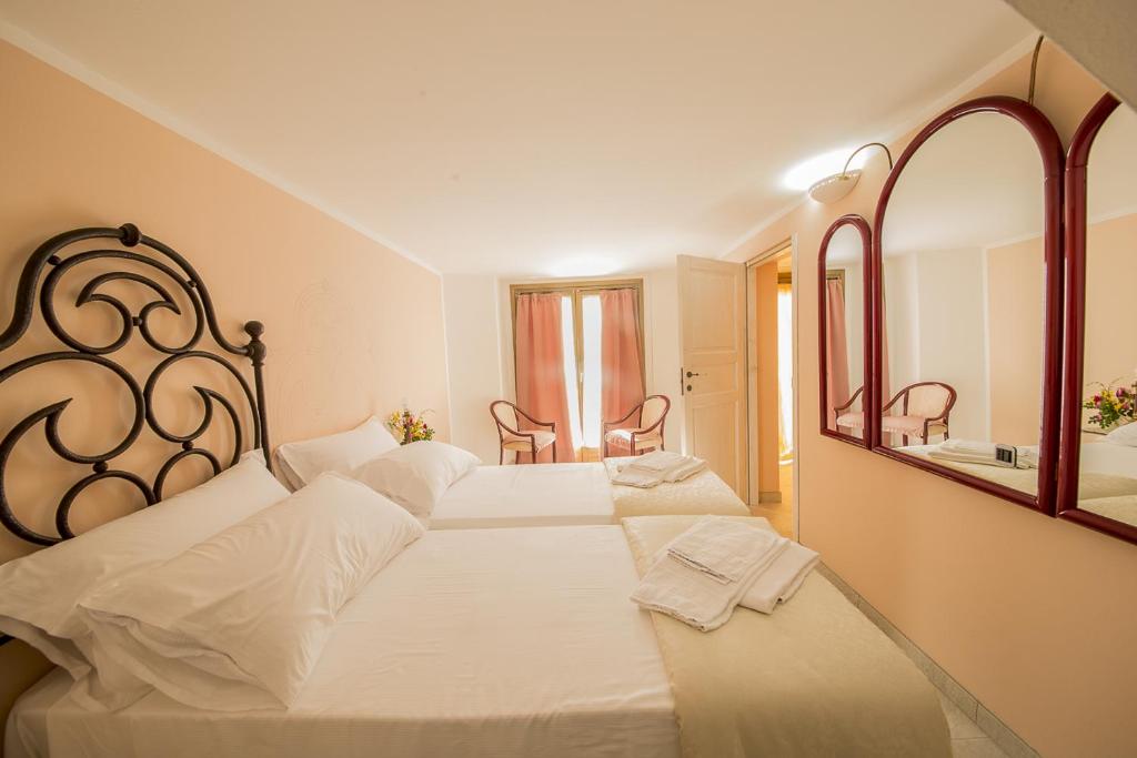 Postel nebo postele na pokoji v ubytování B&B Lambroriver