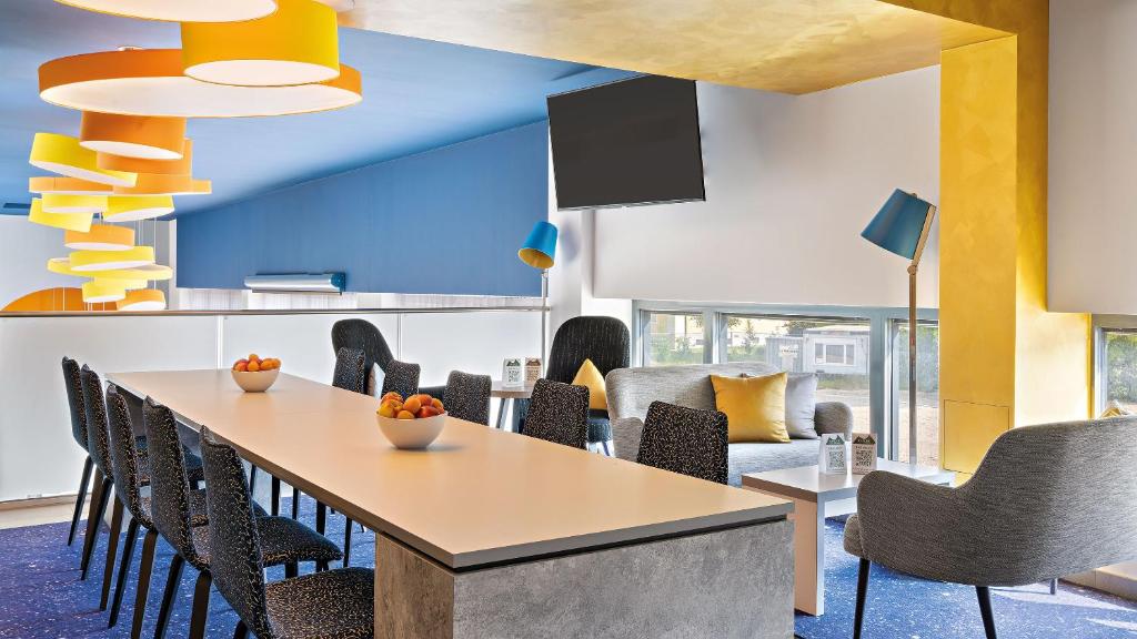 Posezení v ubytování Hey Lou Hotel Nördlingen