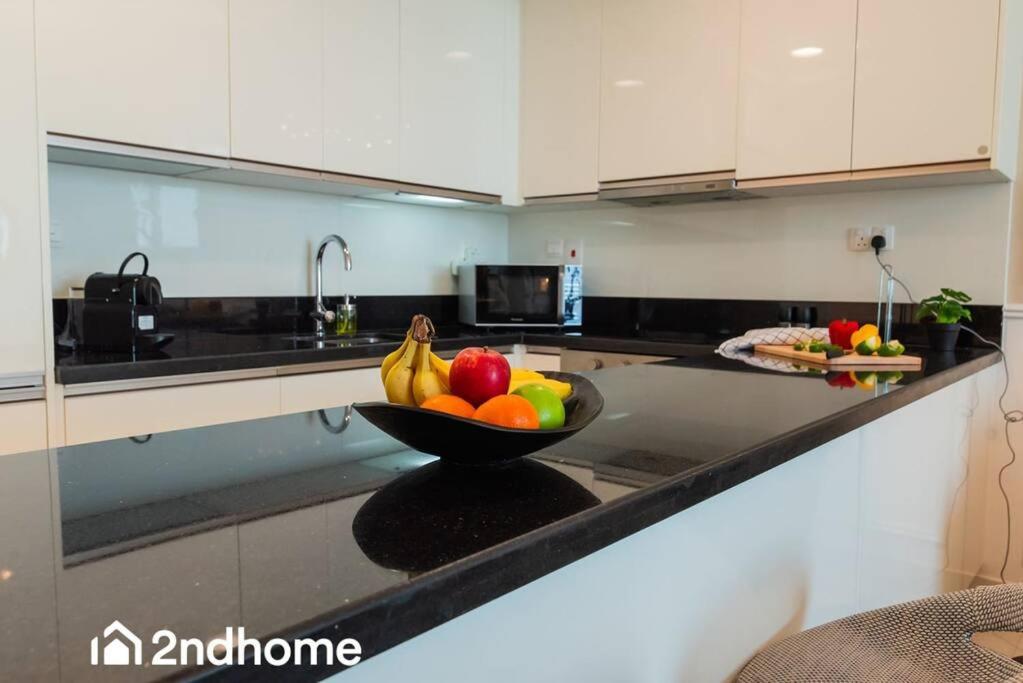 Kuchyň nebo kuchyňský kout v ubytování 2ndHome - Amna Tower, Al Habtoor City