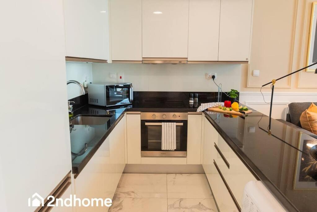 Kuchyň nebo kuchyňský kout v ubytování 2ndHome - Amna Tower, Al Habtoor City