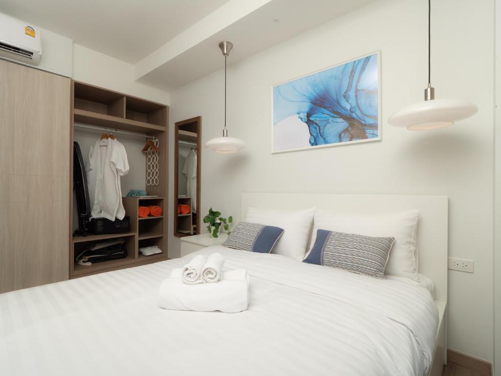 Postel nebo postele na pokoji v ubytování Laguna SkyPark new brand apartments