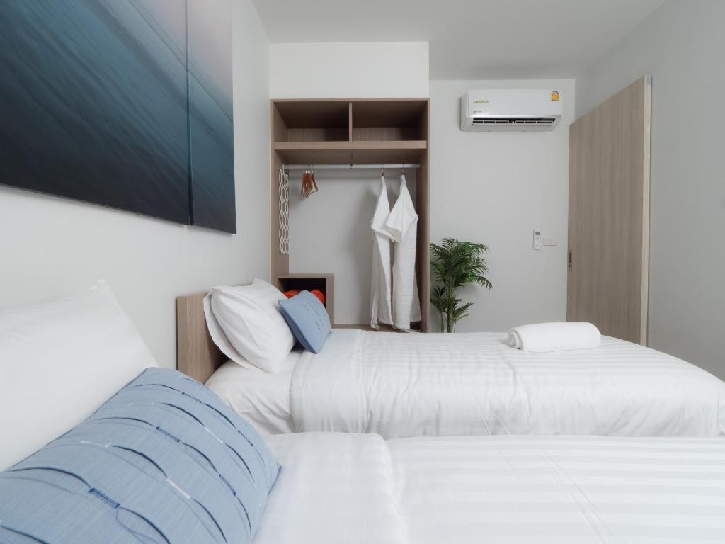 Postel nebo postele na pokoji v ubytování Laguna SkyPark new brand apartments