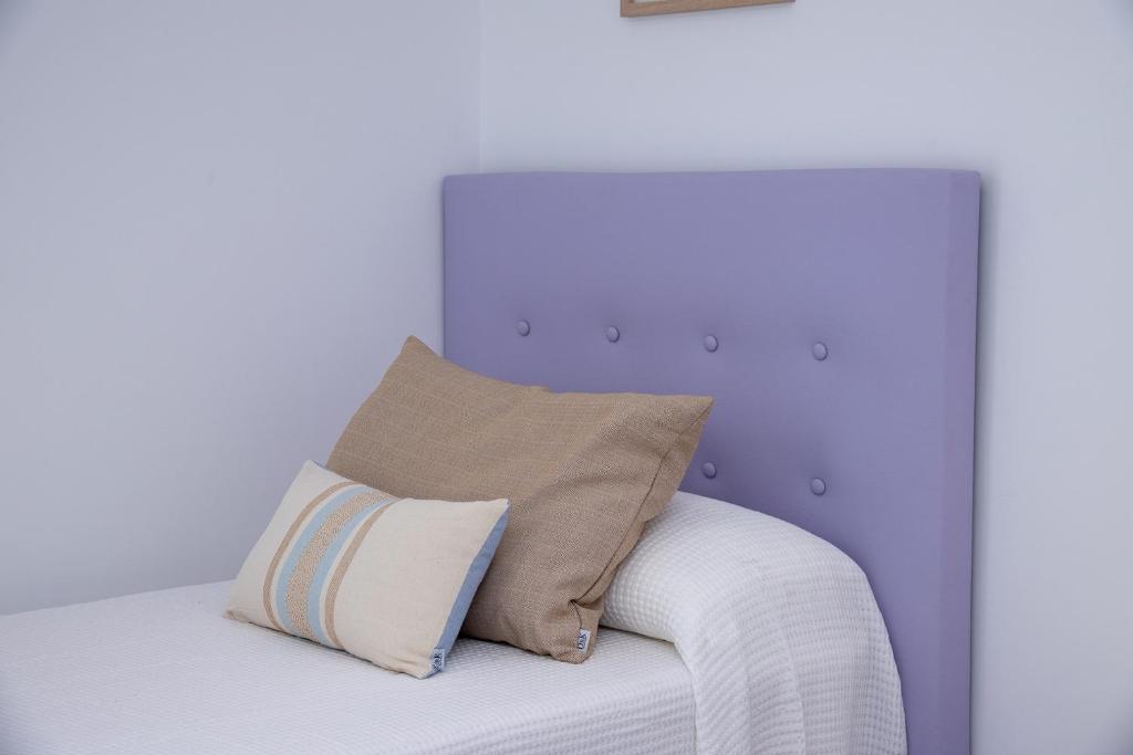 Postel nebo postele na pokoji v ubytování Apartment Holiday 2 Beachfront Corralejo By Holidays Home