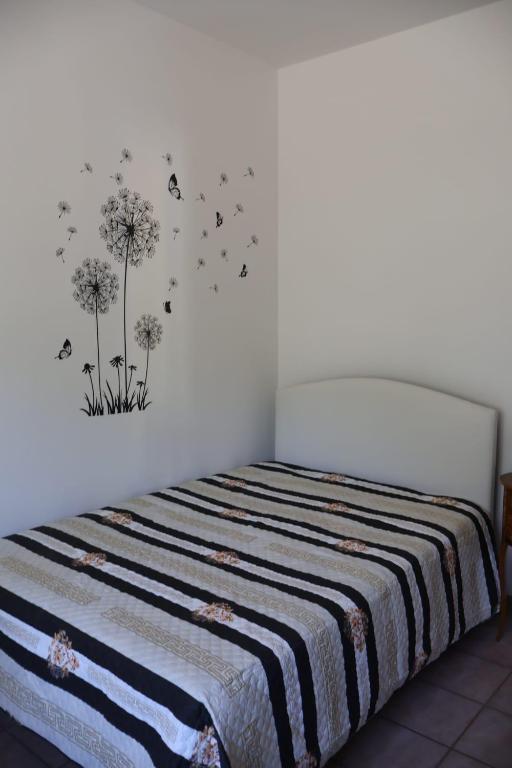 Postel nebo postele na pokoji v ubytování B&b Mamì
