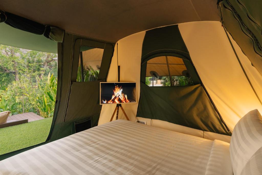 Postel nebo postele na pokoji v ubytování CAMP CAYLA - EDEN