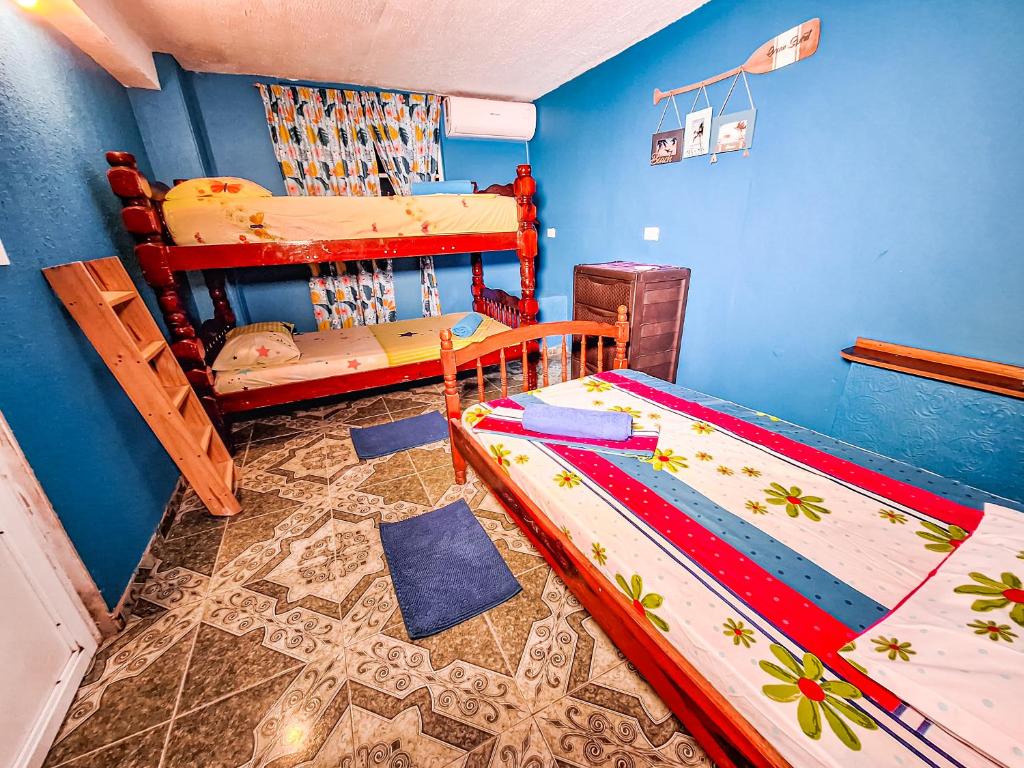 Postel nebo postele na pokoji v ubytování Posada Hostel Adri
