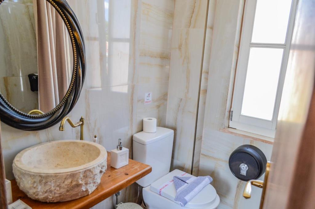 Koupelna v ubytování Bozzali Deluxe Hotel
