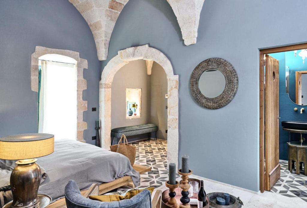 Postel nebo postele na pokoji v ubytování Bambarone La Masseria