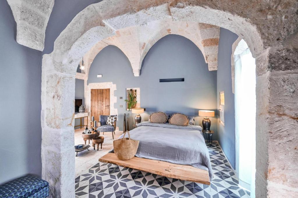 Postel nebo postele na pokoji v ubytování Bambarone La Masseria